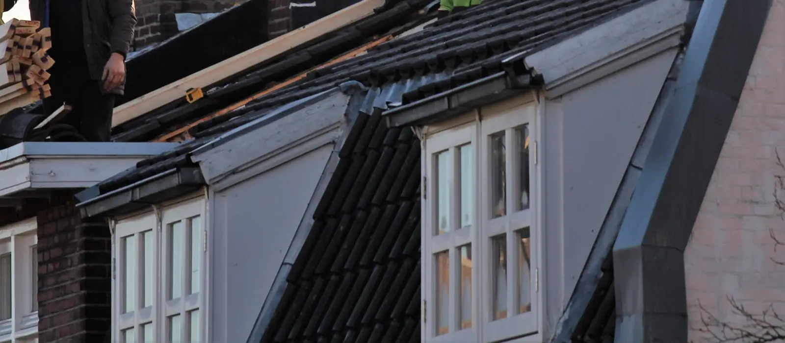 Tiled roof with dormers during roof work